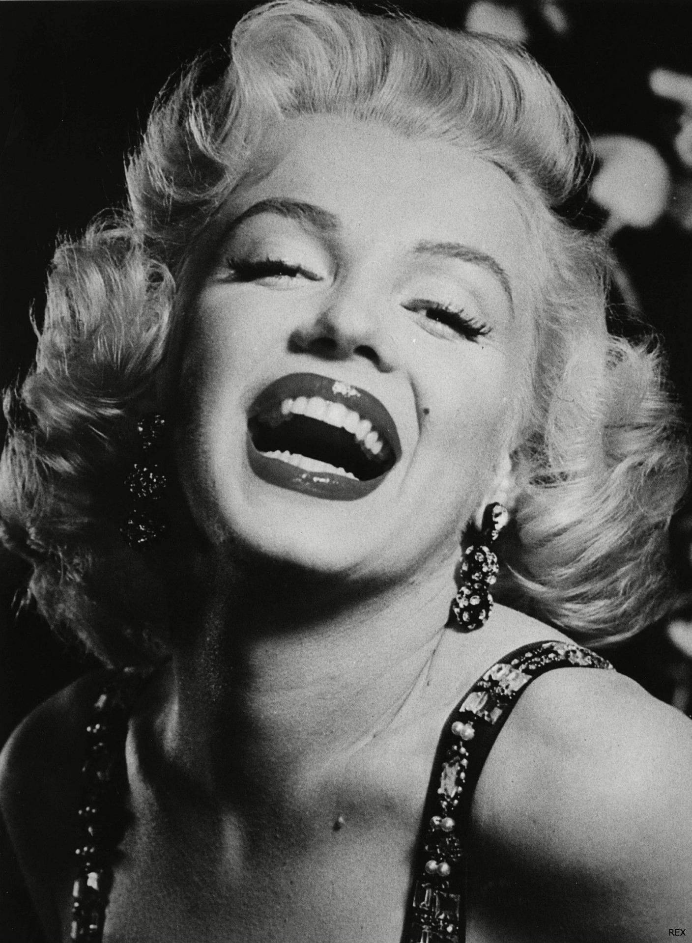 marilyn-monroe-big-laugh-x0xzhczmu3uukefe